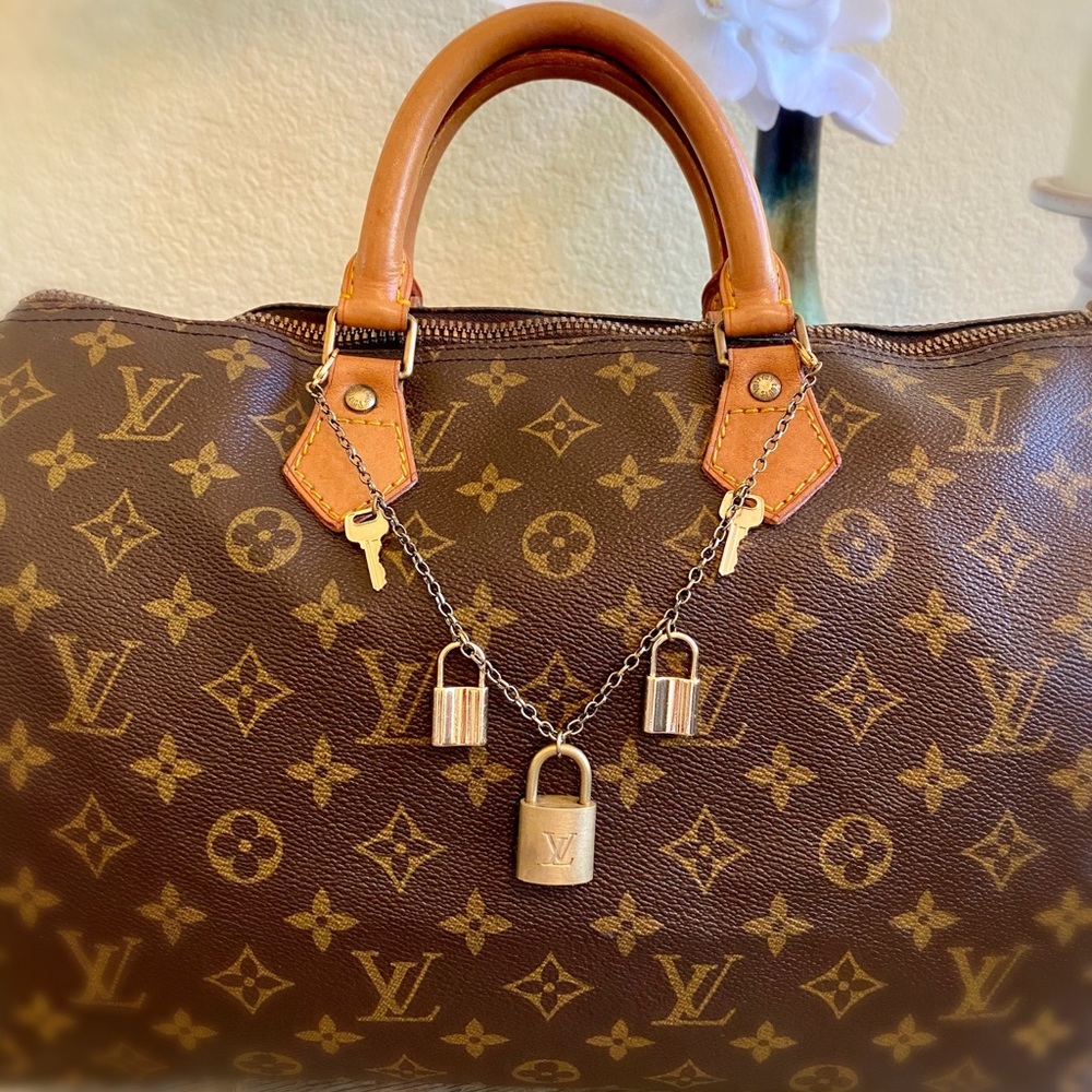 LV Vintage Lock Bag Charm